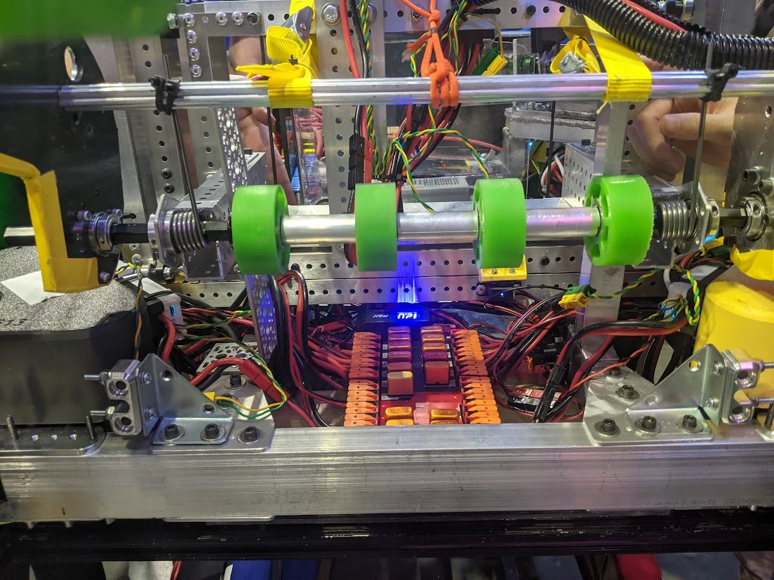 Team 1014's 2025 FRC robot for Reefscape! I worked on and led the team that made the grabber arm to pick up and throw algae (real ones know).