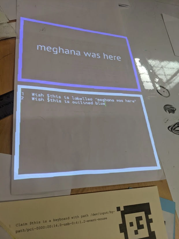 Me visiting the Folk Computer! There's an overhead camera that can read an AprilTag and execute code. It can also play music. Literally insane.